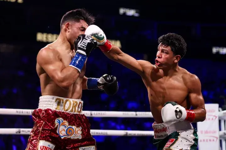Jaime Munguia (right) lands a punch on Armando Resendiz. (May 2, 2026)