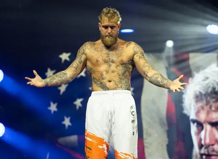 Jake Paul stands onstage at the weigh-in on December 18, 2025, for his boxing match with Anthony Joshua.
