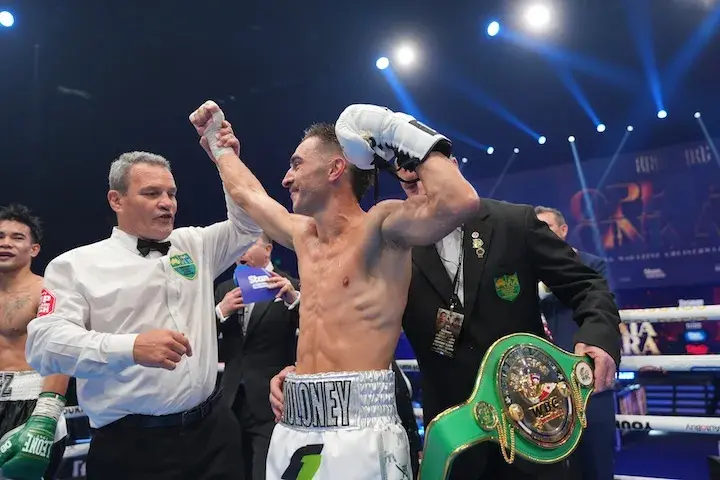 Former WBO 118lbs titlist Jason Moloney has arm raised in victory in his Tasman Fighters debut in Broadbeach, Australia. (December 6, 2025)