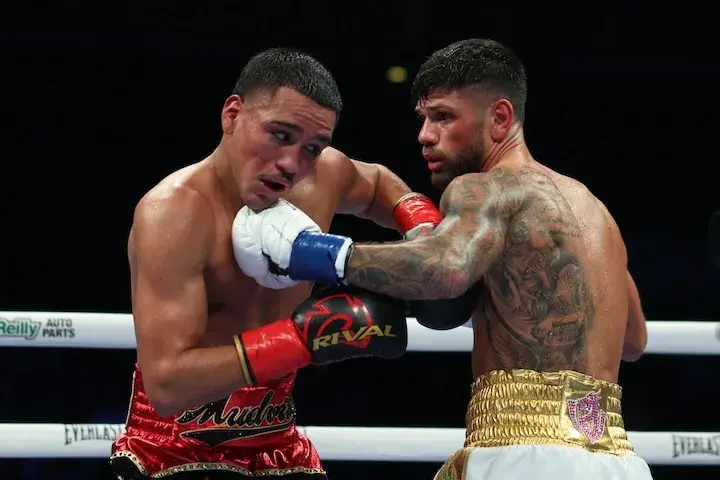 Joe Cordina lands a left hook on Gabriel Flores Jnr during their boxing match on December 13, 2025.