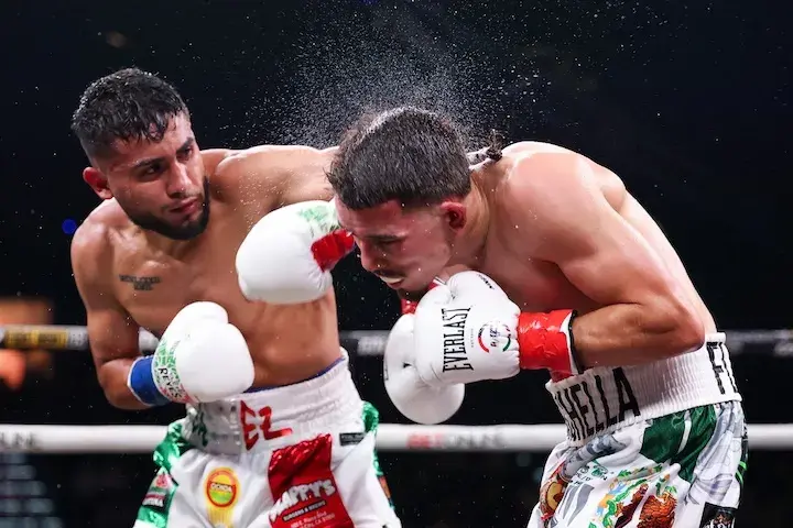 Jorge Chavez lands a left hook on Manny Flores in their fight on July 24, 2025.