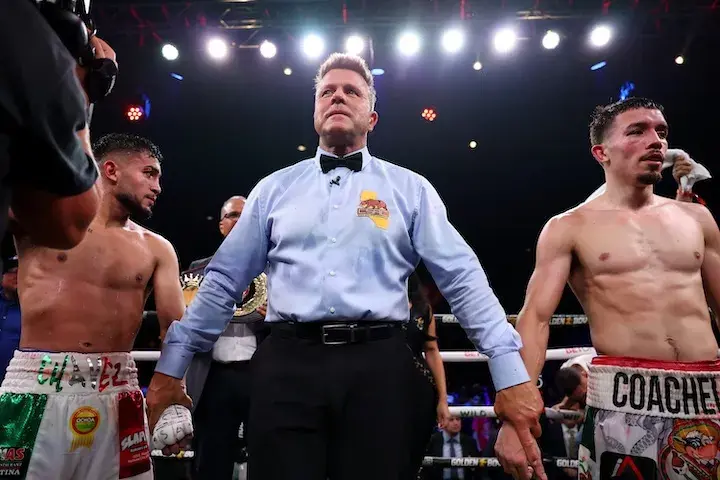 Jorge Chavez and Manny Flores stand with referee Thomas Taylor after their fight on July 24, 2025.