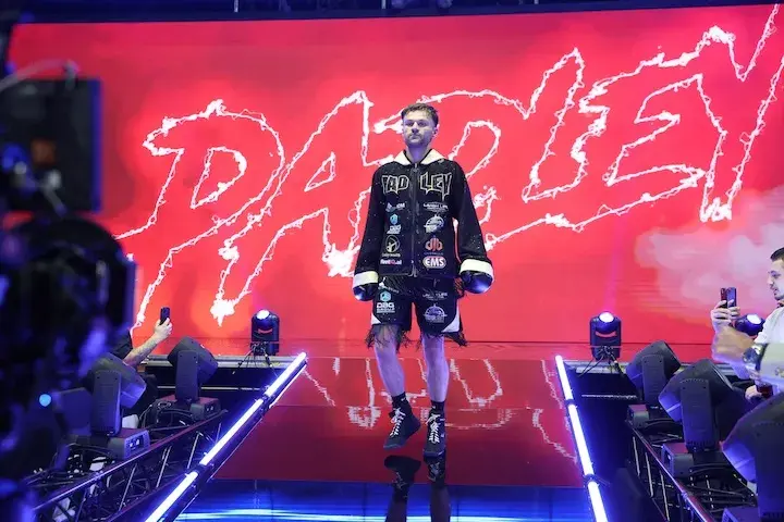 Josh Padley walks to the ring.