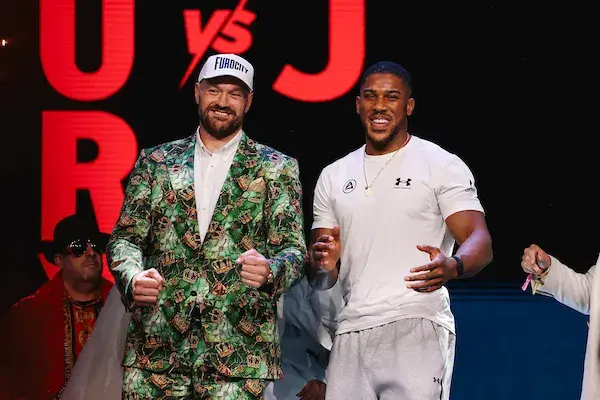 Tyson Fury and Anthony Joshua are all smiles following their September 30 press conference in London