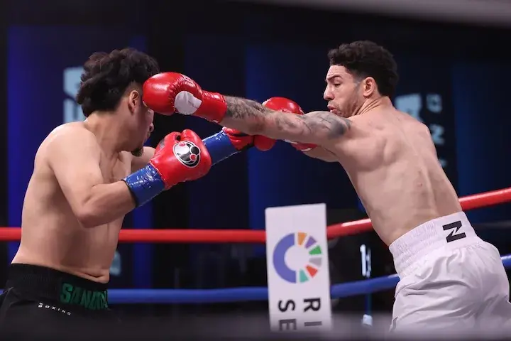 Julian Rodriguez (right) throws a punch at Cain Sandoval on the first Zuffa Boxing card that took place on January 23, 2026.