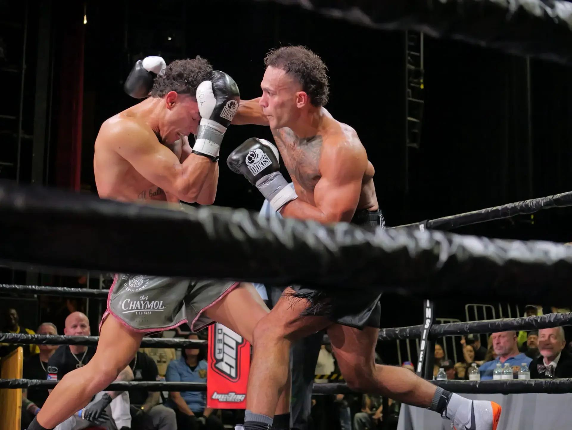 Justin Figueroa (right) and Luis Caraballo Ramos fought to a no decision when an accidental foul ended with Ramos leaving the ring on a stretcher. (March 7, 2026)