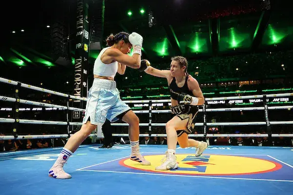 Katie Taylor [right] attacks Flora Pili in Dublin, Ireland