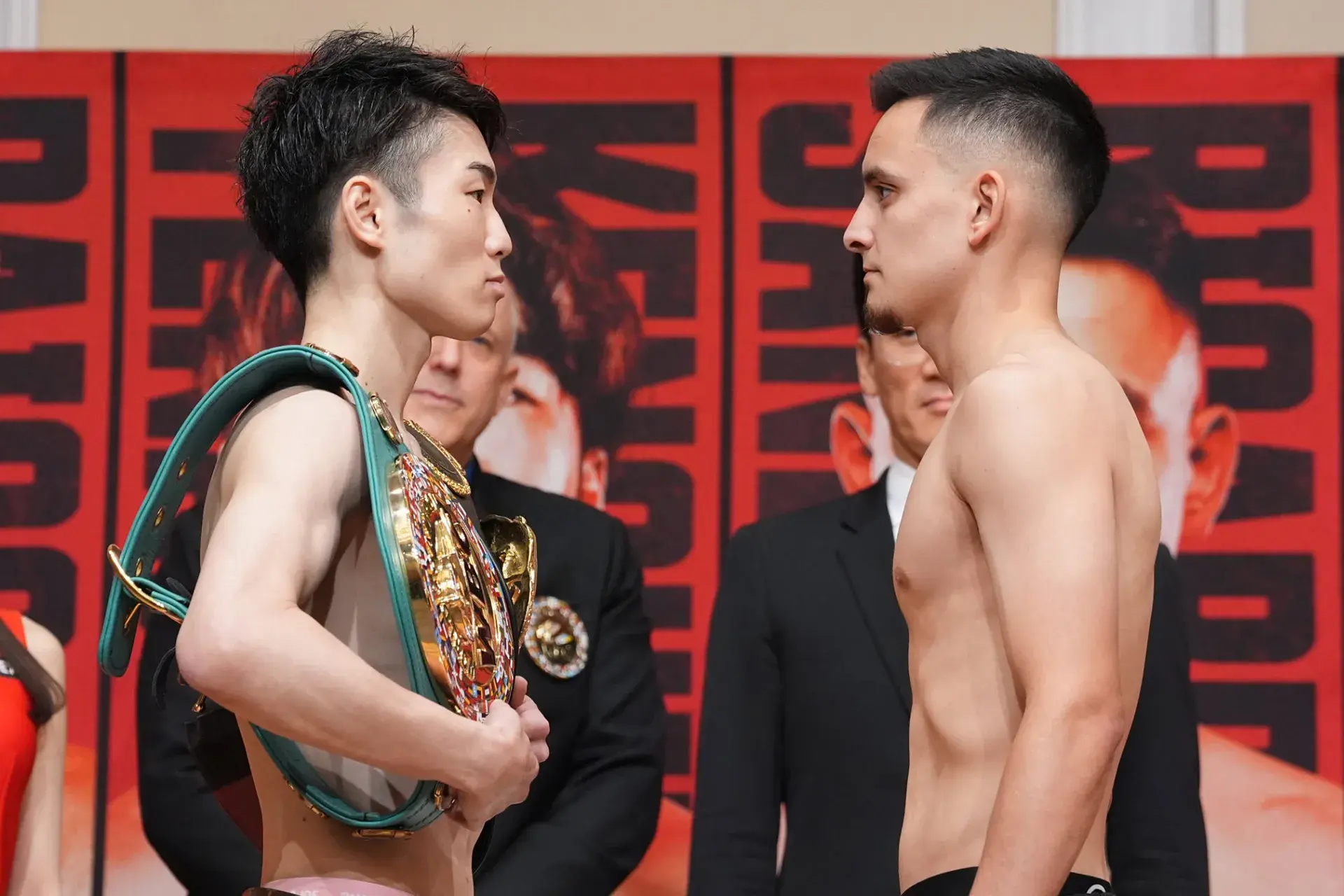 Kenshiro Teraji and Ricardo Sandoval face off after weigh-in for their July 30 WBA/WBC 112lbs title fight in Yokohama, Japan.