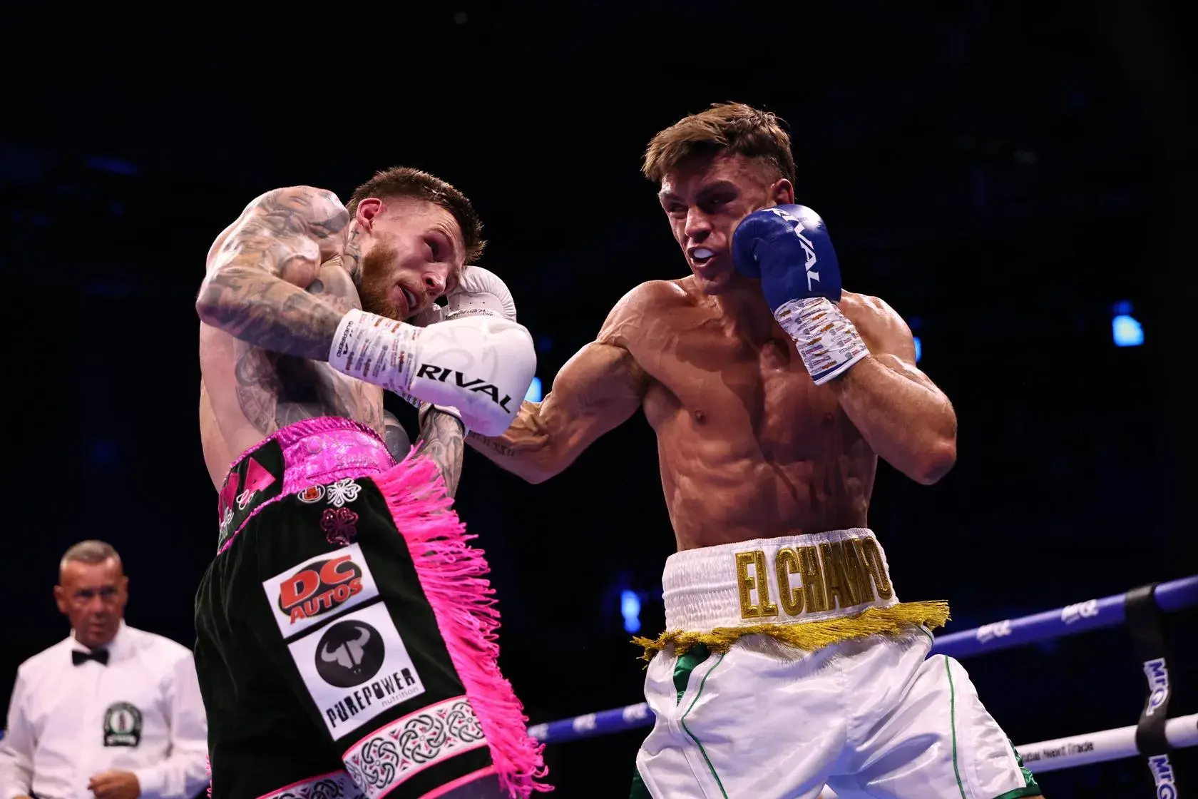 Lee Reeves [right] fires at Garry Cully during their brutal Dublin encounter
