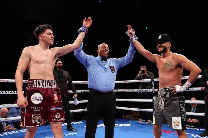 Israel Mercado (right) reacts after the decision is announced for his short-notice, disputed draw against Leo Rubalcava (left). (January 25, 2025)