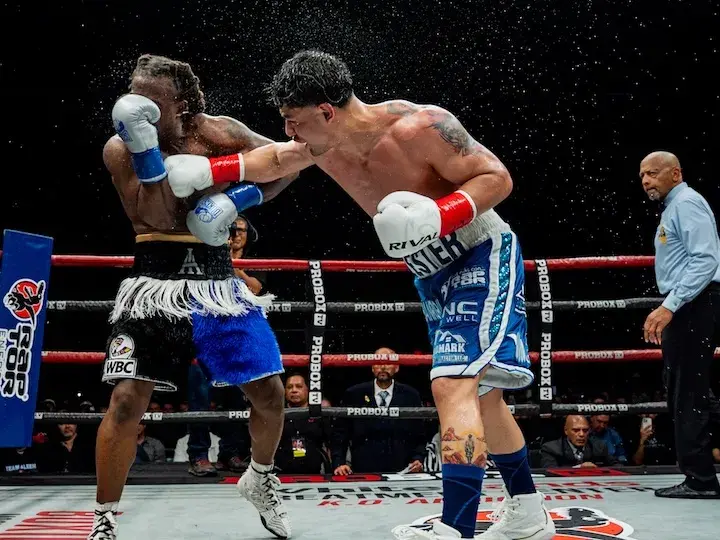 Lester Martinez (right) lands a right hand on Immanuwel Aleem. (March 21, 2026)