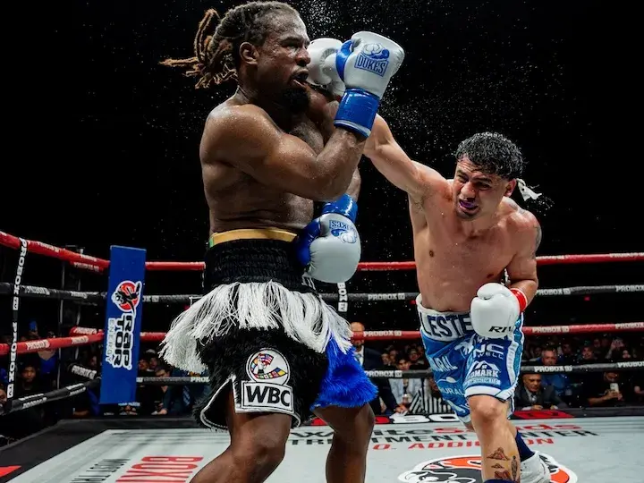 Lester Martinez (right) lands a right hand on Immanuwel Aleem. (March 21, 2026)