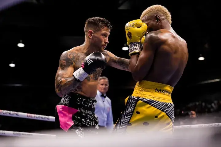 Liam Paro lands on Subriel Matias en route to winning the IBF junior welterweight world title.