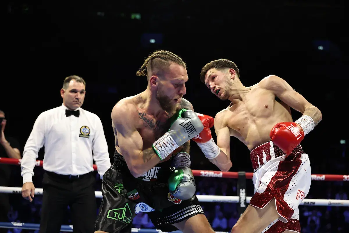 Liam Davies [right] on the attack against Francesco Grandelli on March 28, 2005