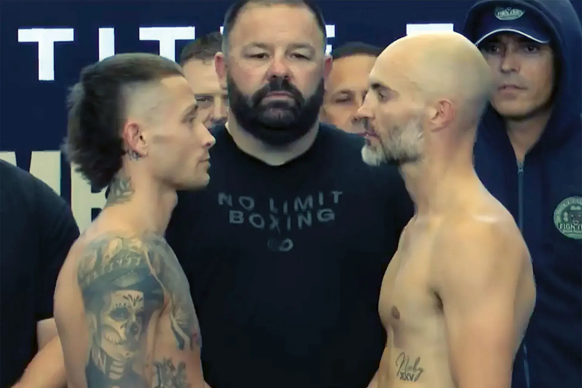 Liam Paro stares down a slightly heavy David Papot during Wednesday's weigh-in.