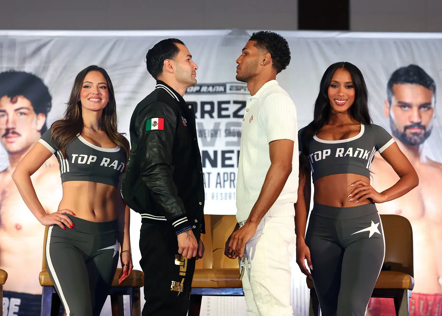 Lindolfo Delgado (L) and Elvis Rodriguez (R) face off.