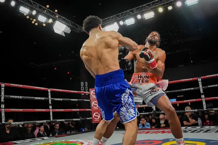 Marlon Harrington scores a first-round knockout against Bryan Polaco in their boxing match on December 18, 2025.