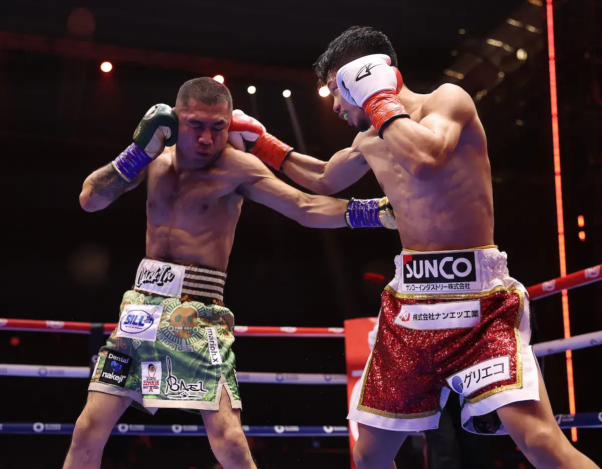 Jnto Nakatani (right) and Sebastian Hernandez trade hooks during their boxing match on December 27, 2025.