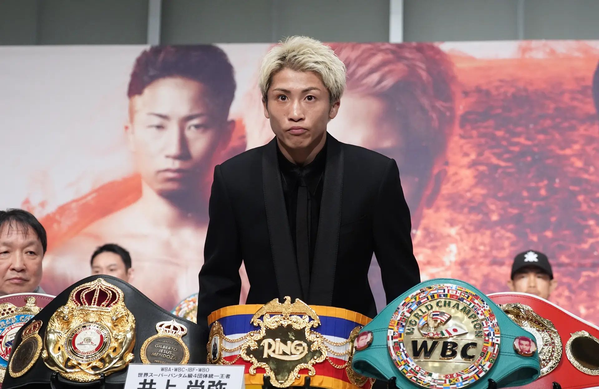 Naoya Inoue stands above his belt collection ahead of his fight with Junto Nakatani
