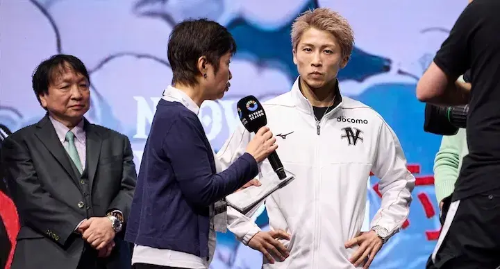 Naoya Inoue is interviewed onstage at the weigh-in on December 26, 2025, ahead of his boxing match with Alan David Picasso.