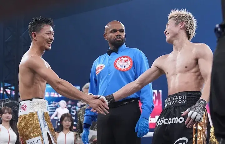 Junto Nakatani (left) and Naoya Inoue (right) shake hands after Saturday's undisputed junior featherweight battle in Tokyo, won by Inoue. (May 2, 2026)