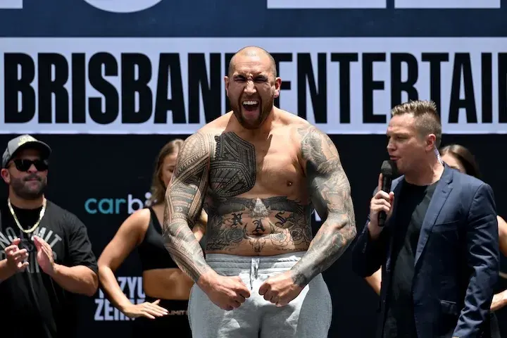 Nelson Asofa Solomona flexes after weighing in on January 14, 2026, ahead of his professional boxing debut.