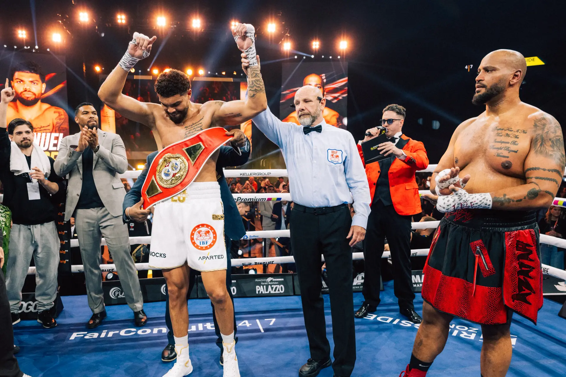 Emanuel Odiase celebrates victory over Nick Webb