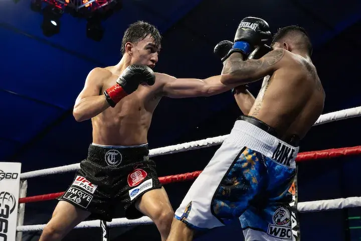 Omar Trinidad routs Mike Plania as Rafael Espinoza looks on