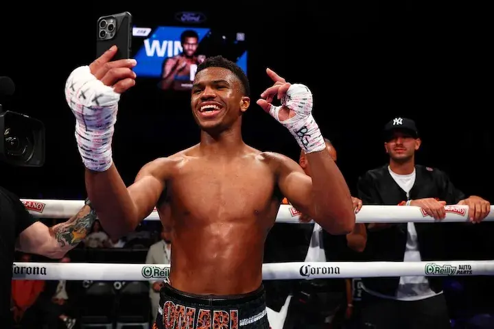 Omari Jones takes a selfie in the ring after knocking out Alfredo Rodolfo Blanco on July 1, 2025.