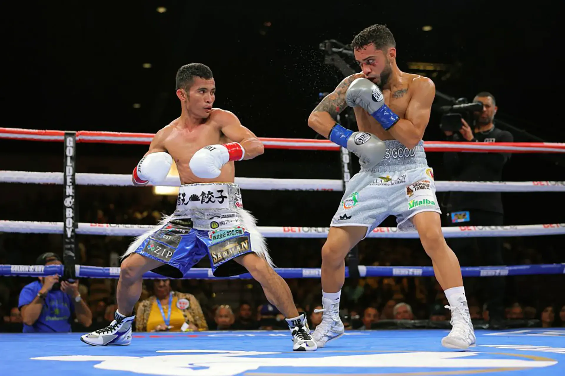 Oscar Collazo defends against Melvin Jerusalem en route to winning the WBO 105lbs title on May 28, 2023 in Indio, California.