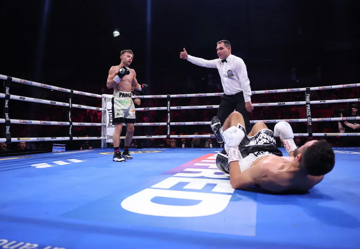 Josh Padley stands over Belmehdi