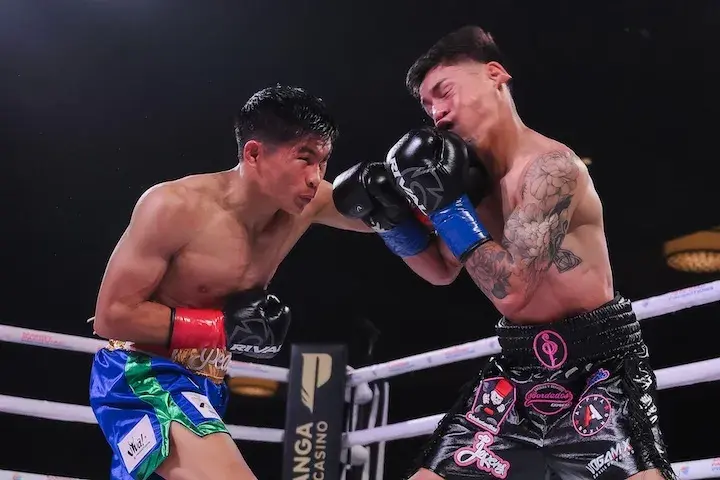 Pedro Taduran (left) lands a punishing blow on Gustavo Perez Alvarez. (April 3, 2026)