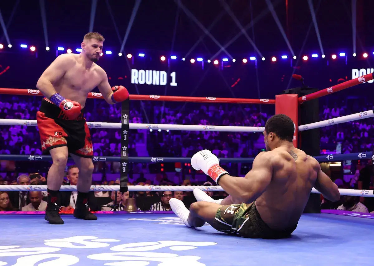 Anthony Joshua, in a shocking moment, hits the deck in the opening round against Kristian Prenga
