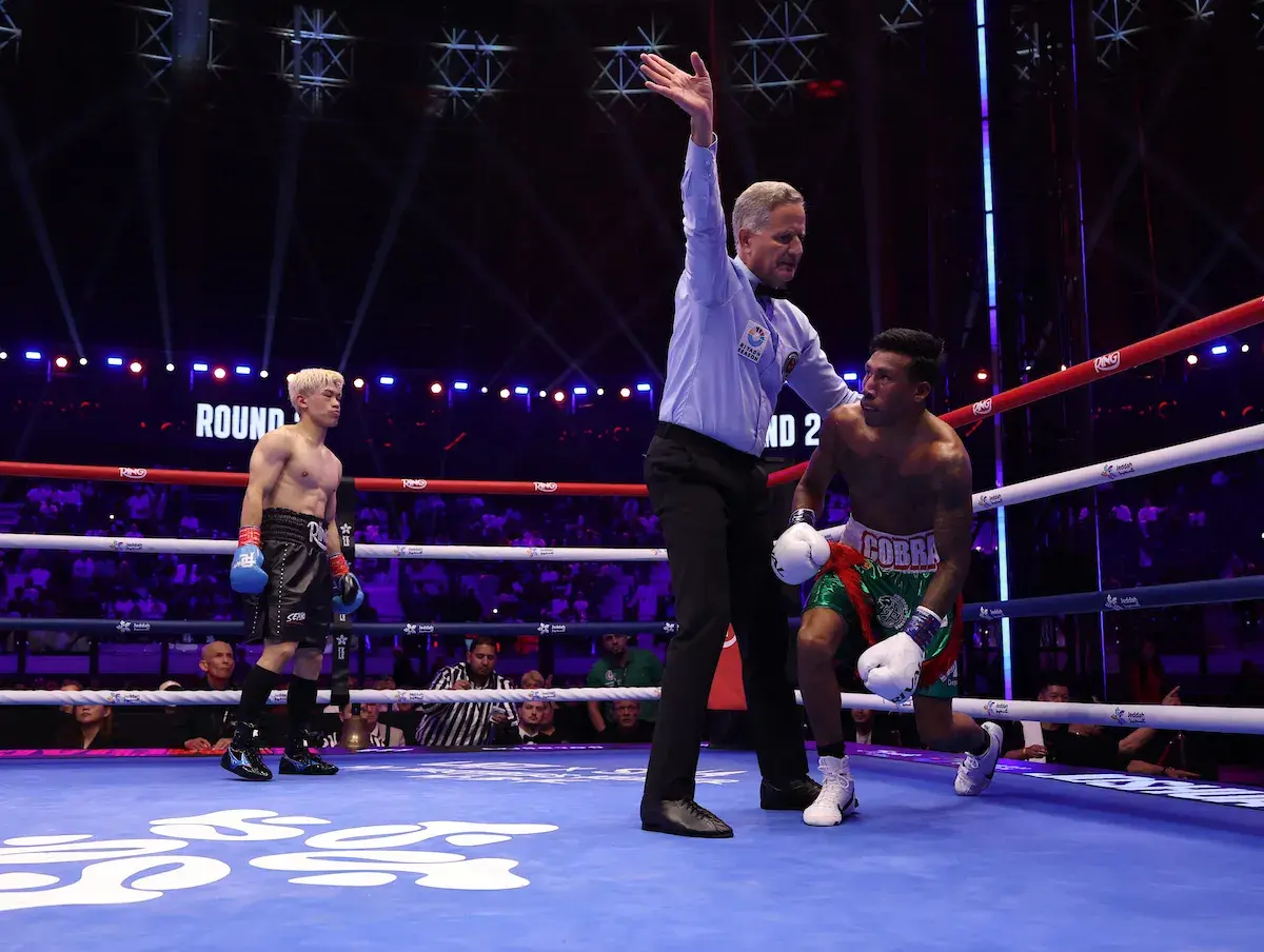 Reito Tsutsumi celebrates defeating Alvino Herrera