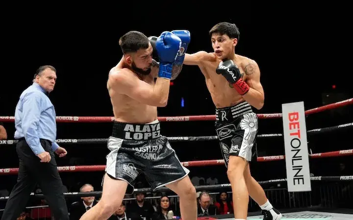 Ruben Eduardo Aguilar (right) lands a punch on Louie Lopez. (February 27, 2026)