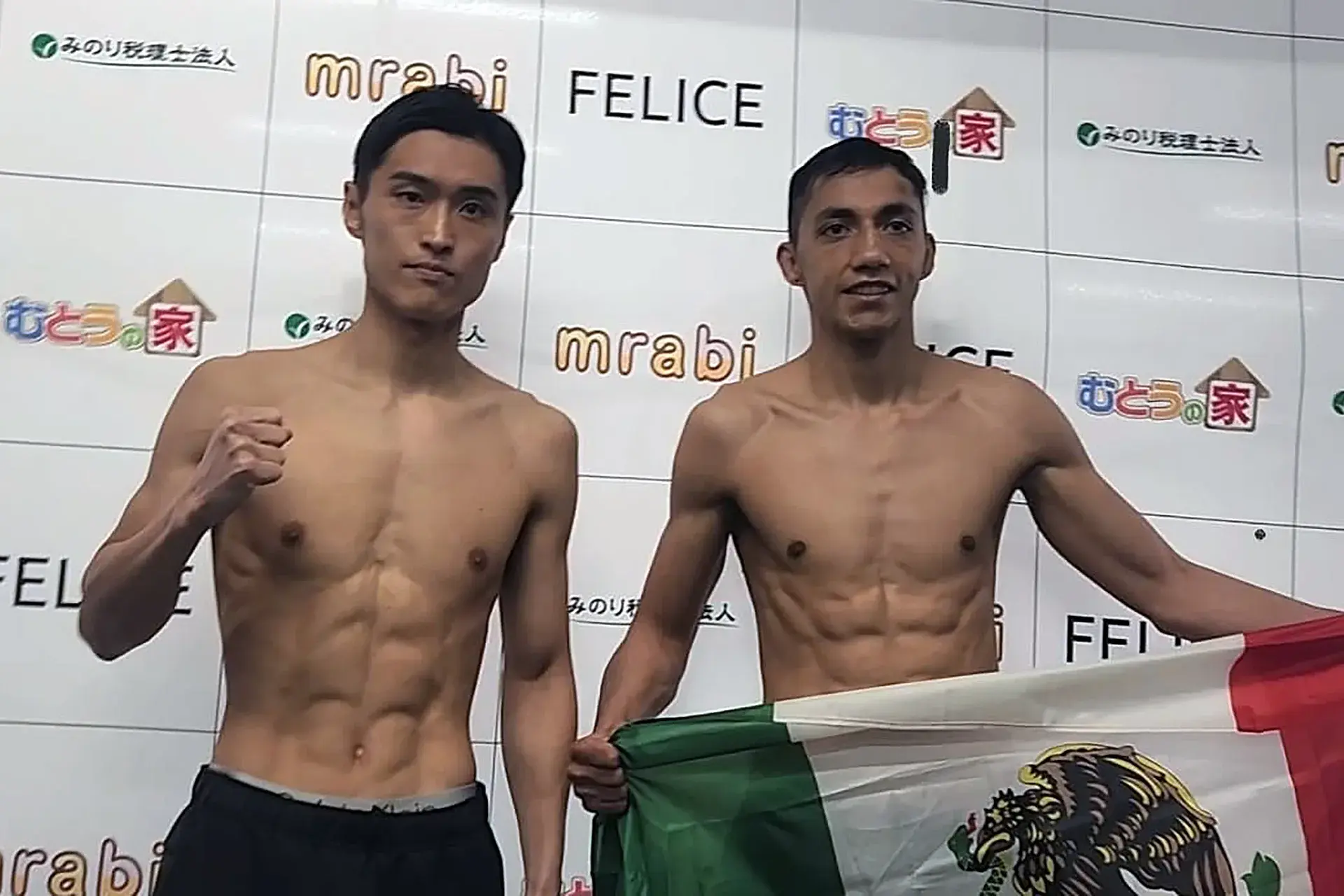 Ryosuke Nishida and Bryan Mercado pose after making weight for their February 15 IBF 122lbs title eliminator in Osaka, Japan.