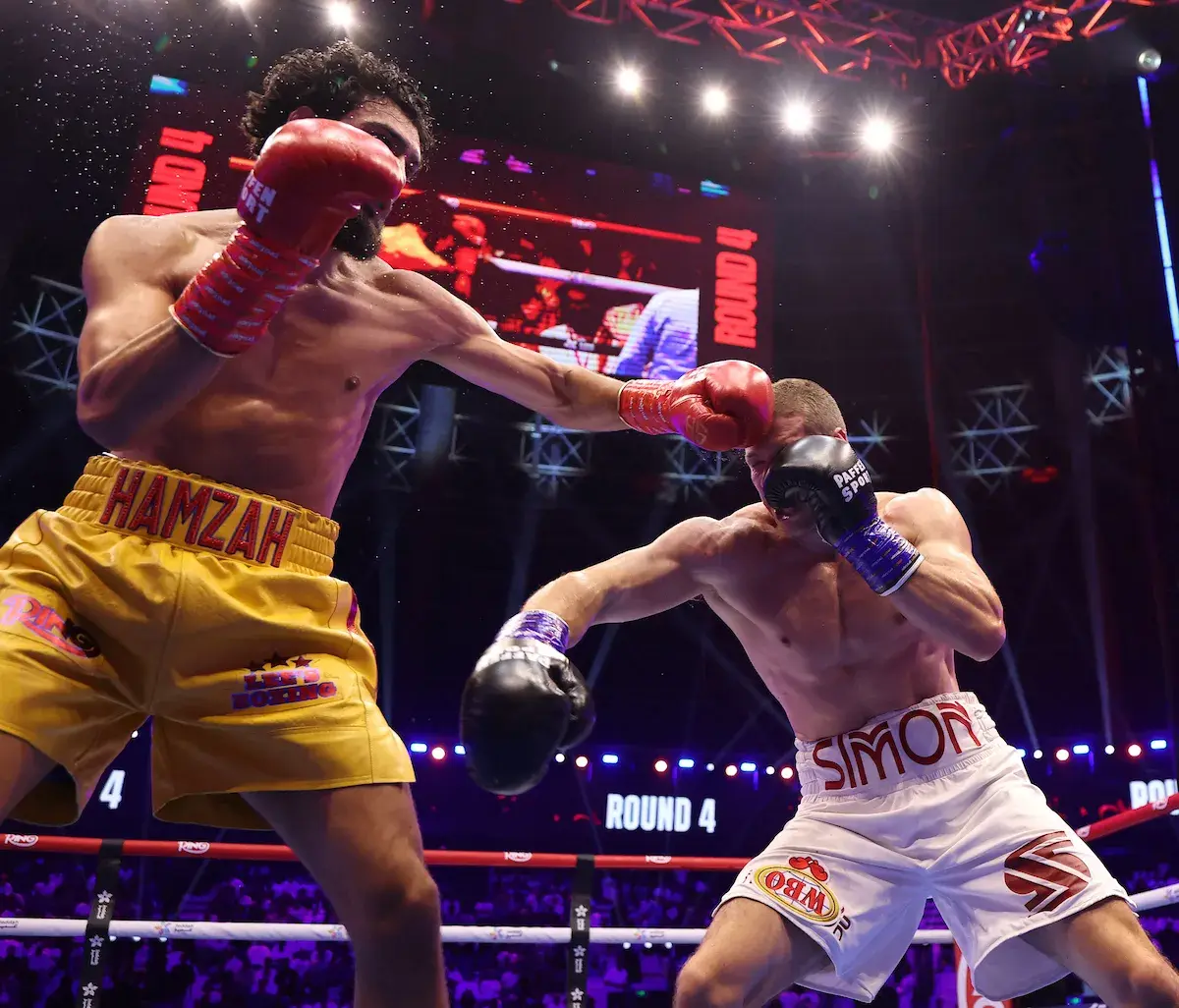 Hamzah Sheeraz lands a left hand on Simon Zachenhuber