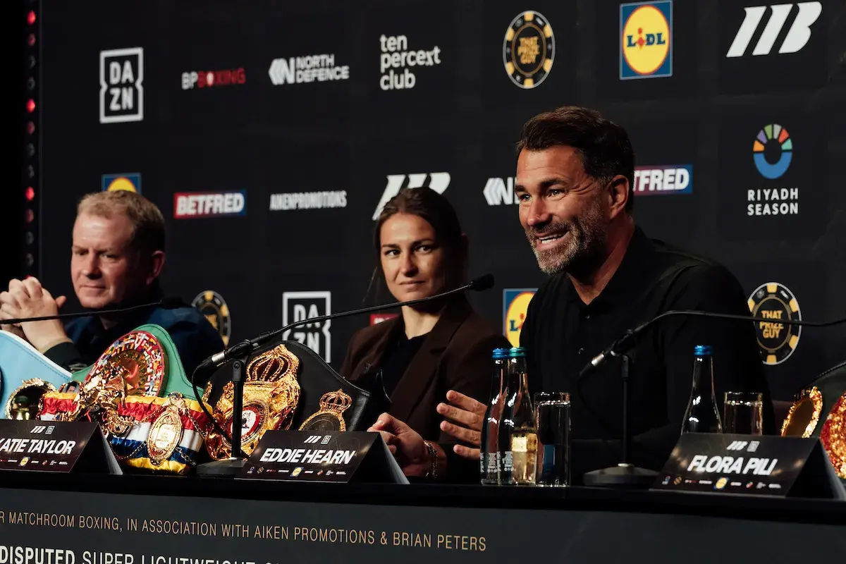 Brian Peters, Katie Taylor, and Eddie Hearn