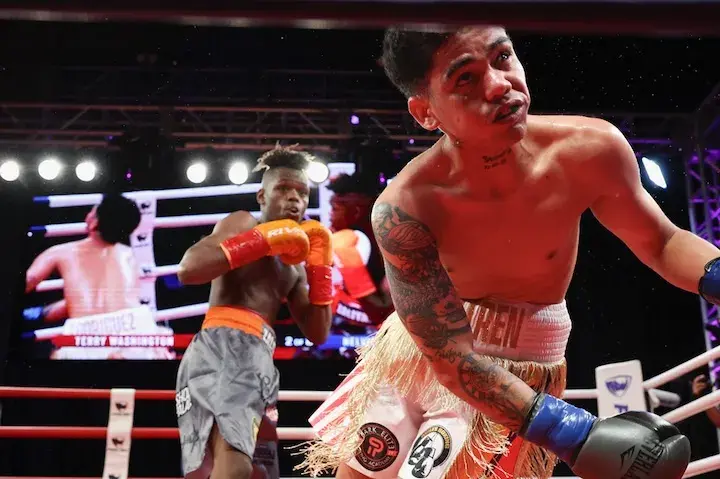 Terry Washington (left) after landing a knockout punch.