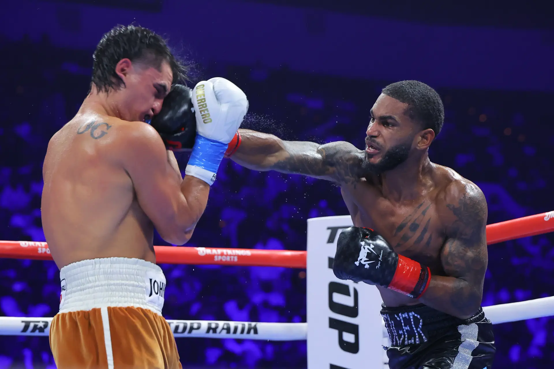 Delante Johnson slams home a right hand against Christopher Guerrero on July 4, 2026