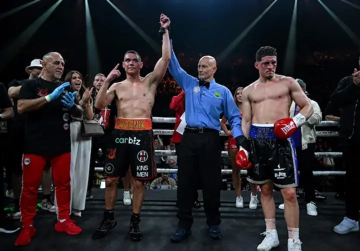 Tim Tszyu has his arm raised in the air by the referee after winning a wide decision over Anthony Velazquez on December 17, 2025.