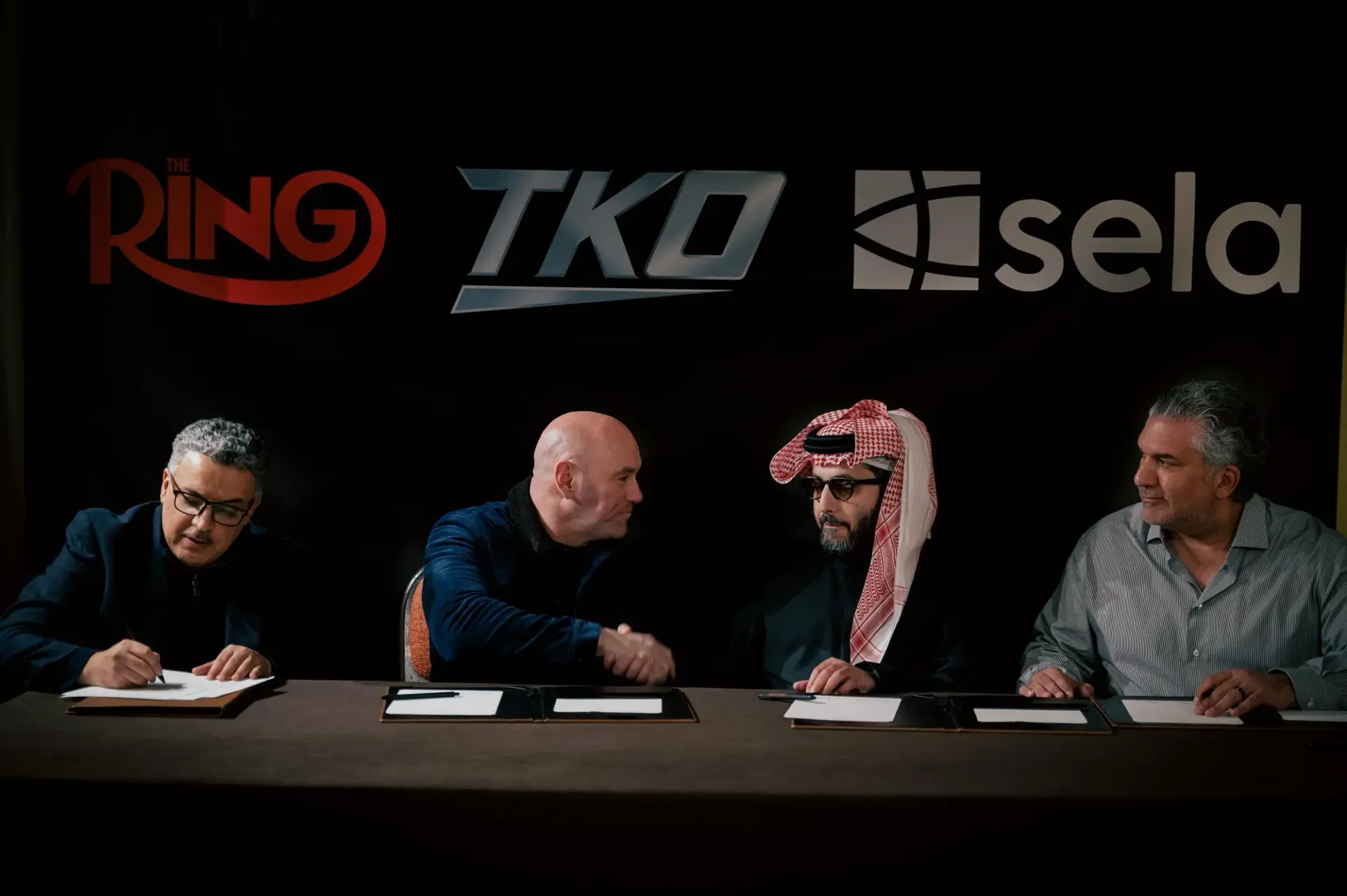 Dana White and Turki Alalshikh take center stage as they shake hands on their alliance in March 2025