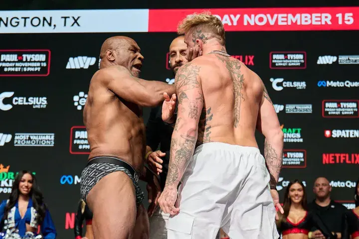 Mike Tyson and Jake Paul hit the scales ahead of Friday spectacle