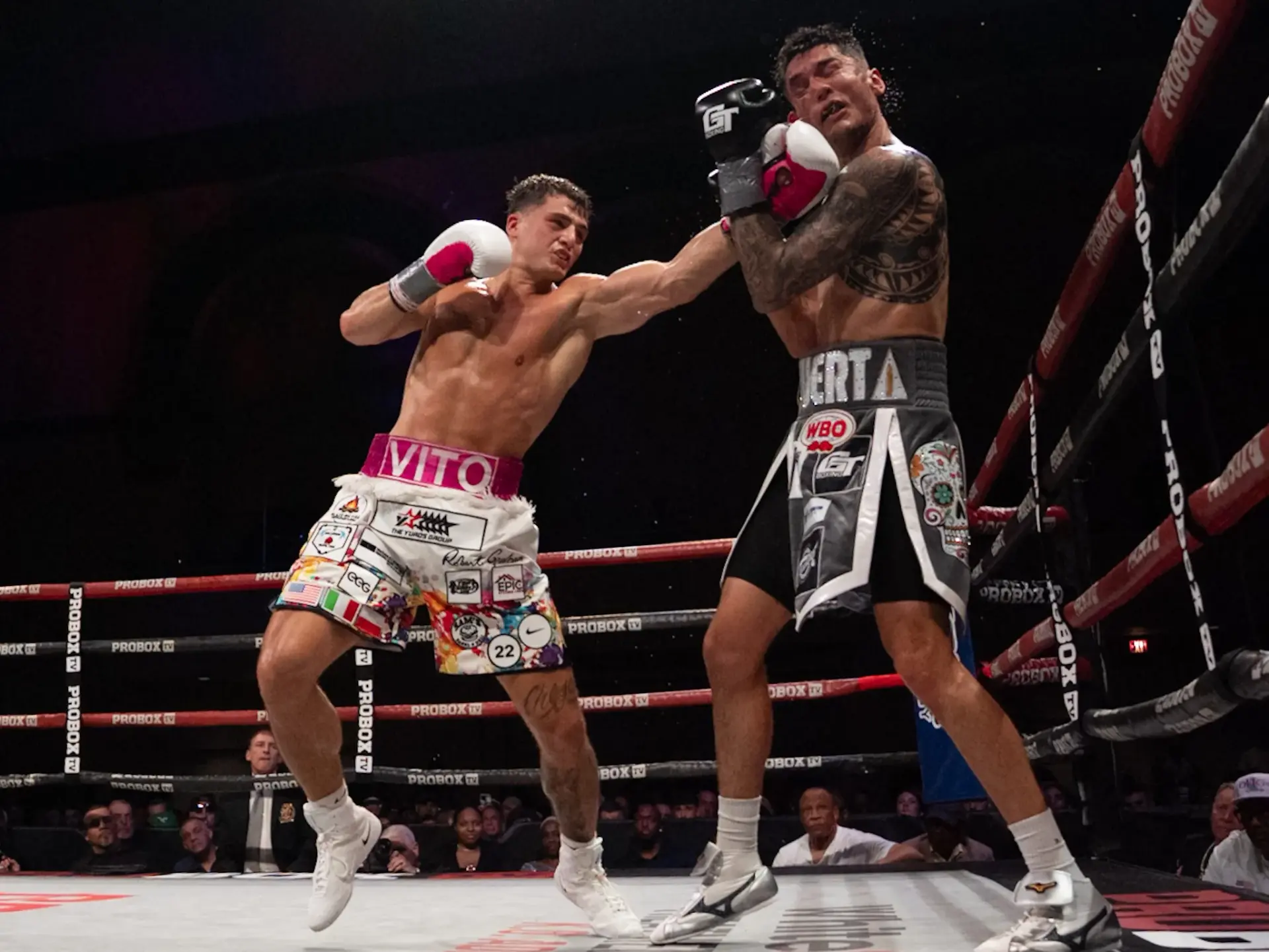 Vito Mielnicki Jnr (left) lands a shot on Omar Huerta in their boxing match on April 11, 2026.