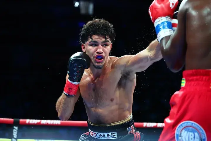 Xander Zayas (left) lands a punch on Abass Baraou during their fight on January 31, 2026