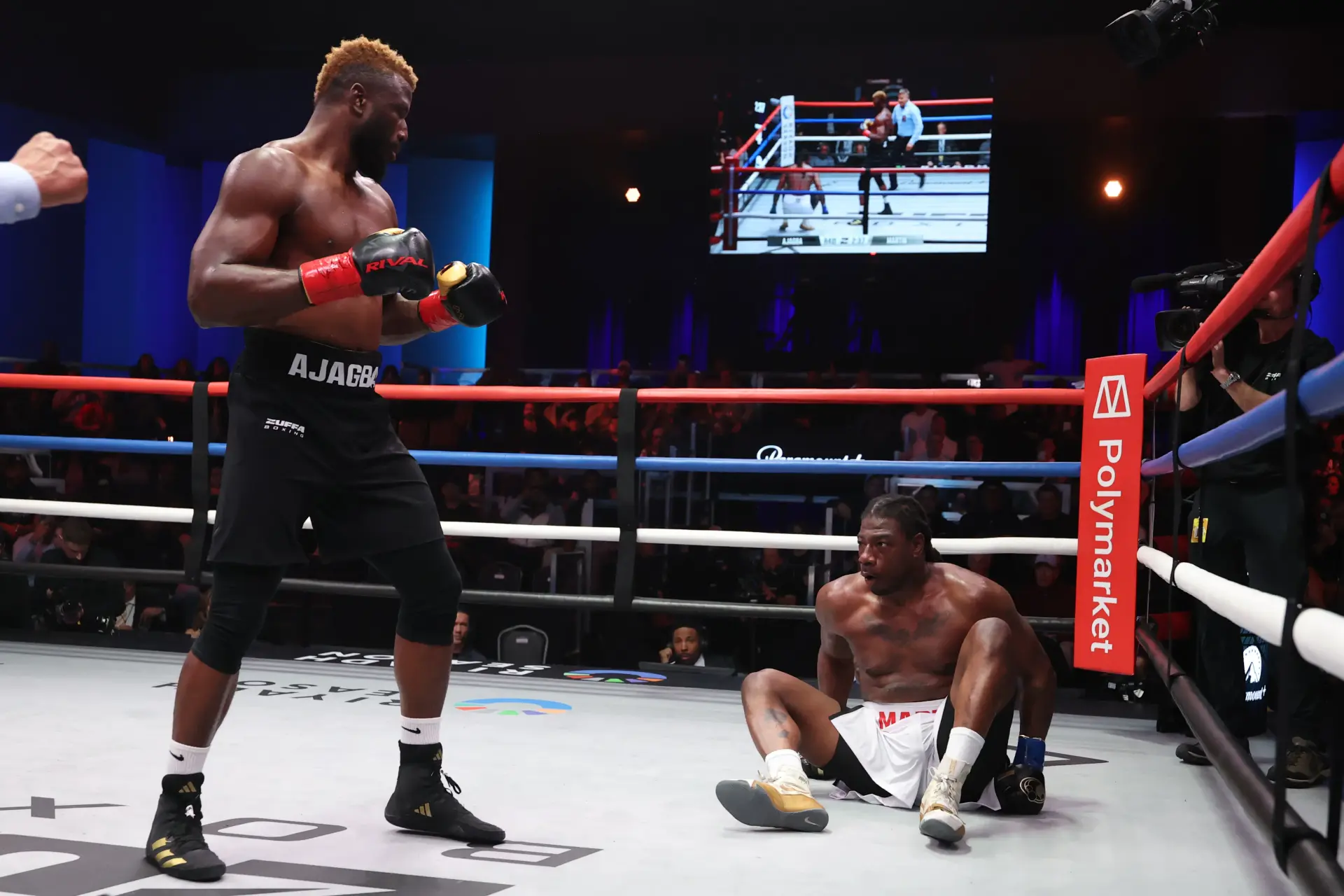 Eje Ajagba stands over Charles Martin