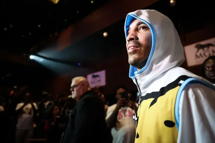 Emmanuel Rodriguez walks to the ring for a boxing match.