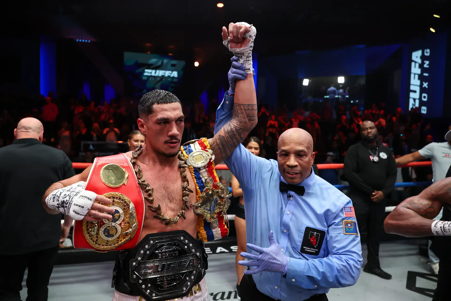 Jai Opetaia wears his belts after beating Brandon Glanton.