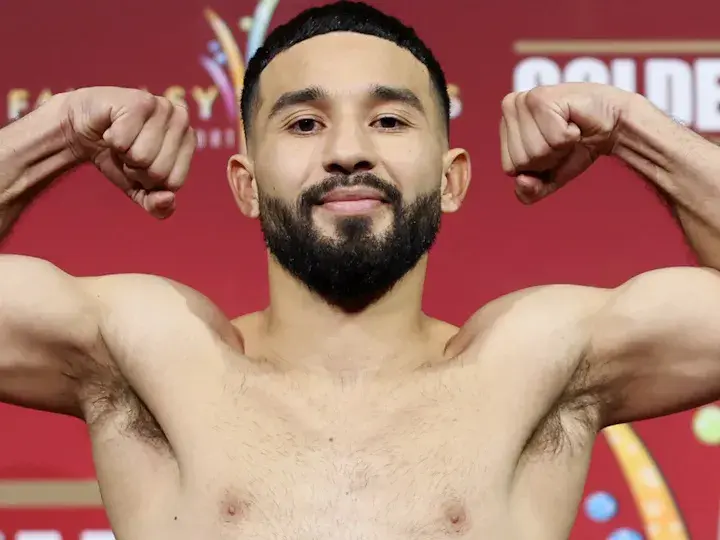 Jose Tito Sanchez poses after weighing in.