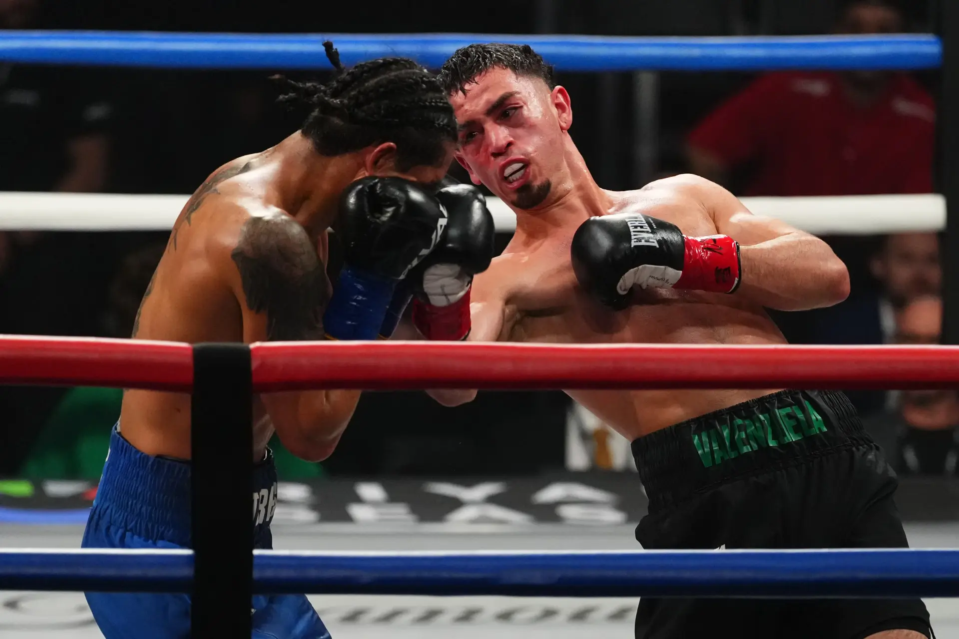 Jose "Rayo" Valenzuela lands an uppercut on Diego Torres.